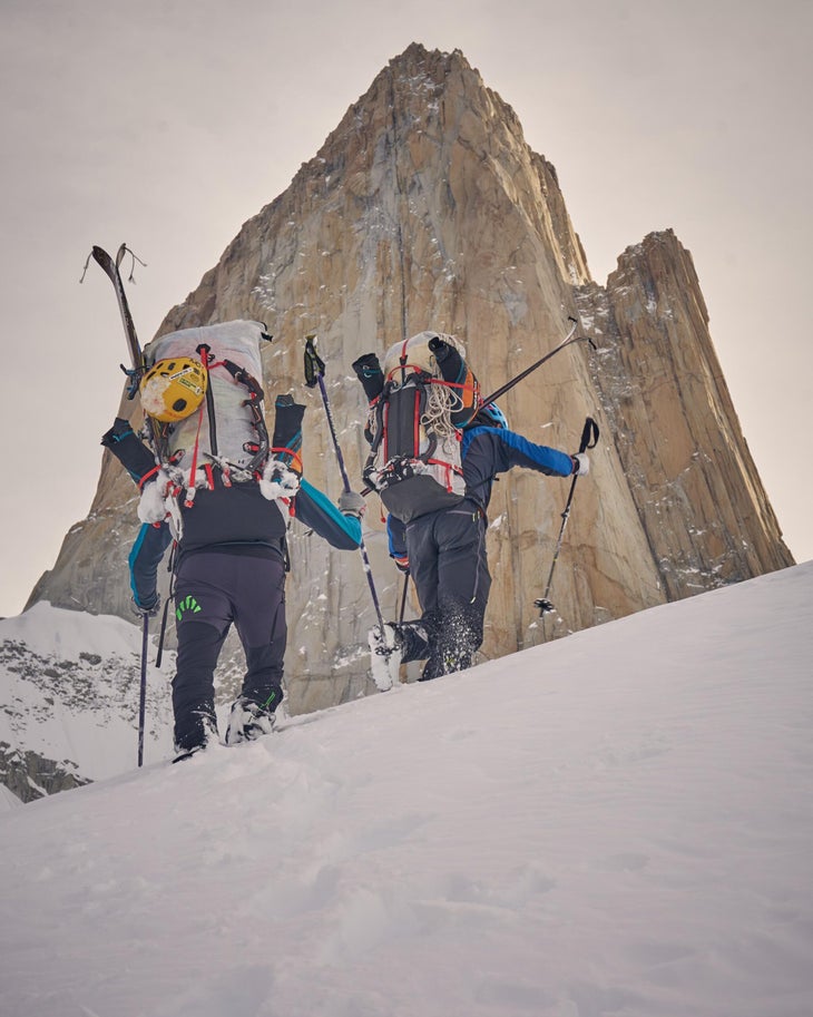 Matteo Della Bordella and Marco Majori lug 55-pound (25-kilogram) packs to the base of the Goretta Pillar for their first attempt in August.