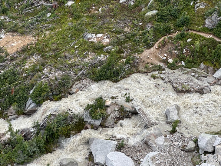 A portion of the Bugaboo hiking trail which typically includes just a brief river crossing by bridge. The trail is currently submerged and prompted a rescue of many climbers and hikers.