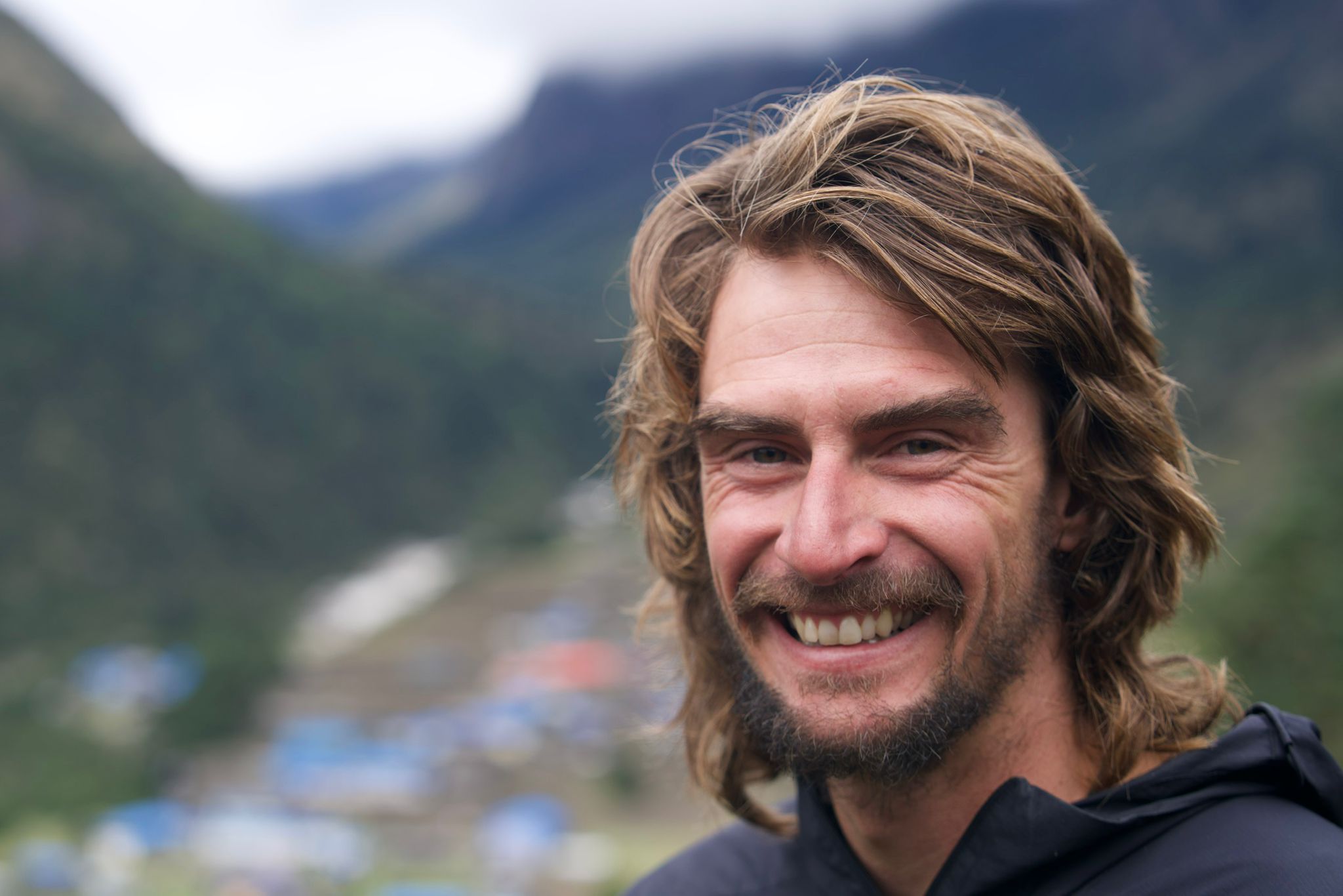 American alpinist Michael Gardner smiles at basecamp. The alpinist was recently killed in a fall in Nepal.